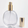 50ml Flat Round Shoulder Glass Perfume Bottle With Golden Sprayer Cap